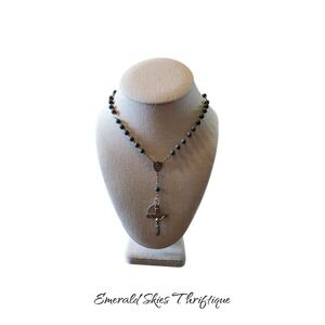 Sterling Silver beaded rosary with sacred heart of Jesus medallion.